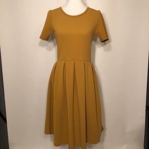 Lularoe Amelia Size M. Mustard Yellow